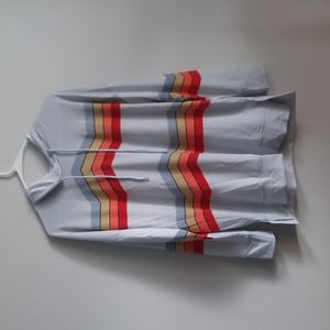 Rainbow Hoodie.  Light blue background.   Size medium.